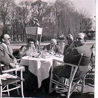 (L-R) Will Lang Jr., Dida Comacho, David "Chim" Seymour, Louise Lang, and Yale Joel at a cafe in the Bois de Boulogne after World War II
