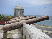 Cannons from the Colonial times over city walls.