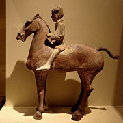 A Western Han Dynasty ceramic model of a cavalryman.