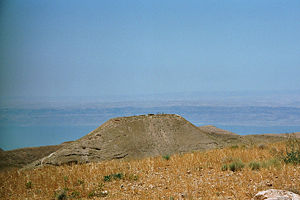 Panoramic view of Machaerus with the Dead Sea and Israel in the background.