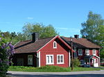 Traditional Swedish rural house, painted in the traditional Swedish Falu red