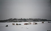 Ice fishing on the Ottawa river, near the capital of Canada