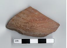 Pottery shard bearing an inscription similar to the name Goliath.