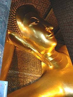 The head of the Reclining Buddha which is 46 meters long and 15 meters high,  at Wat Pho in Bangkok