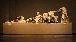 The left hand group of surviving figures from the East Pediment of the Parthenon, exhibited as part of the Elgin Marbles in the British Museum.
