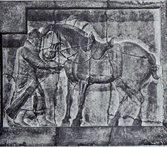 A bas-relief of a soldier and horse with elaborate saddle and stirrups, from the tomb of Emperor Taizong, c. 650.