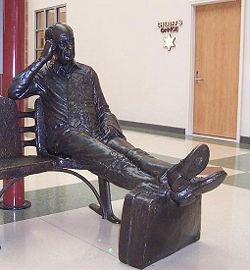 A statue of Stevenson showing the hole in the sole of his shoe at Central Illinois Regional Airport