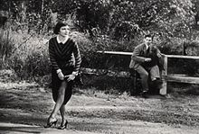 Colbert teaches co-star Clark Gable hitch-hiking, in It Happened One Night (1934)