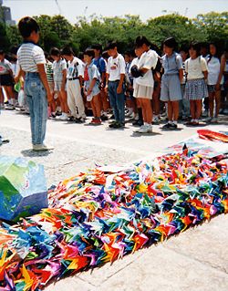 Japanese school children bring their peace cranes to the Hiroshima Peace Park.