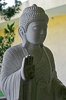 A stone image of the Buddha