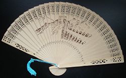 A hand-held fan.