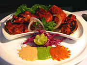 Chicken tikka, a well-known dish across the globe, reflects the amalgamation of Indian cooking styles with those from Central Asia