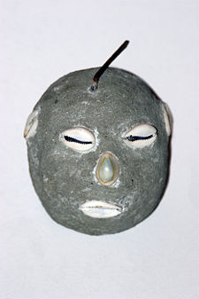The trickster Ellegguá worshiped in Santería.