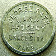 Aluminum trade token from Osage,Kansas.
