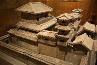 A pottery miniature of a palace made during the Han Dynasty; as a palace attendant, Zhang Heng had personal access to Emperor Shun and the right to escort him