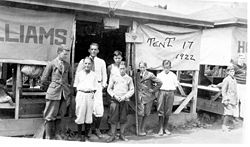Campers and staff of the Becket Chimney Corners YMCA in front of their tent, 1922