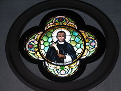 Stained glass window depicting Saint Martin of Porres