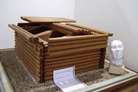 Model of the inside wooden construction of the tumulus of Midas in Fordion with the reconstructed head of the man buried here