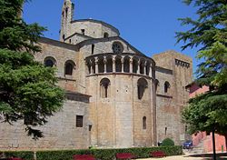 The apse of the Cathedral of la Seu d'Urgell, Spain, has a round-topped windows, an arcade with colonnettes and an ocular window.pic K.Jeaves