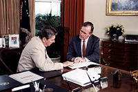 Vice President Bush in a meeting with president Ronald Reagan in 1984