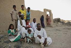 Al-Nadhir Tag al-Sir Bashir, considered the poet of the Manasir tribe in Northern Sudan, with his family