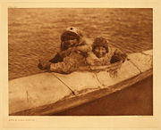 Boys in kayak, Nunivak, Alaska, photographed by Edward S. Curtis, 1930.