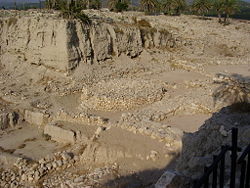 Ruins of ancient temple with rounded altar (center)