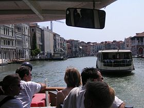 Two vaporetti approach each other on the Canale Grande.