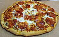 A homemade pepperoni pizza.
