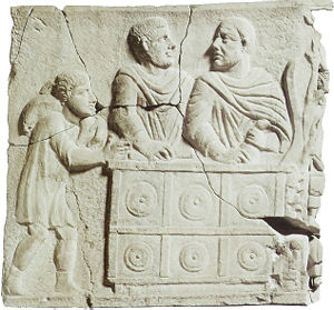 Roman sculpture showing moneychanger from fourth century B.C.E.