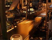 High-speed conveyor with bar code scanner for sorting transport packages