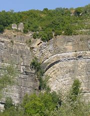 A fault in Bédarieux, France. The left part moves down while the right part moves up.