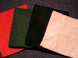 A selection of four different felt cloths.
