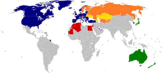 A world map with countries in blue, cyan, orange, yellow, purple, and green, based on their NATO affiliation.
