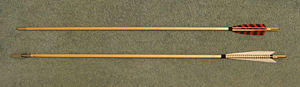 Traditional target arrow and replica medieval arrow.