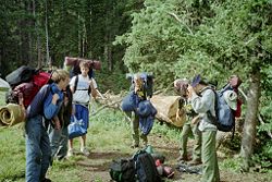 A team of Varsity Scouts getting ready to head out on a backpacking trip.