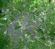 Satellite image of Berlin, with the wall's location marked in yellow