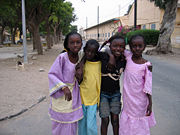 Girls gather on a street