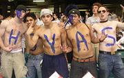 Students cheering for Georgetown's men's basketball team
