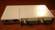 Networked dual-tuner for ATSC and QAM