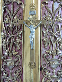 A ornate crucifix made in metals, from the altar of the Church of St. Gordianus und Epimachus, Aitrach, Landkreis Ravensburg.