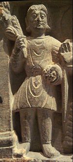 A Buddhist devotee in Kushan dress, Mathura, 2nd century. The Kushan dress, generally depicted as quite stiff, had been made of leather (Francine Tissot, "Gandhara").