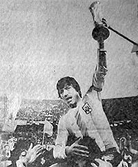 Argentine captain Daniel Passarella raises the World Cup trophy.