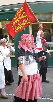 Performers in traditional Jersey costume at a cultural festival
