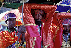 A priest is holding a Tabot in a Timket (Epiphany) ceremony at Gondar, Ethiopia, at which water will be blessed.