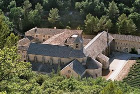 The Romanesque Abbey of Senaque, France, is surrounded by monastic buildings of various dates.