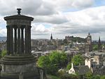 View over Auld Reekie, with the Dugald Stewart Monument in the foreground.