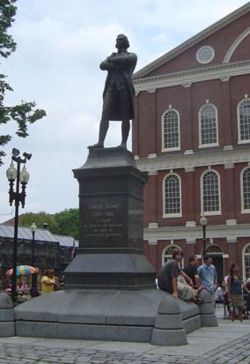 This statue of Samuel Adams in front of Faneuil Hall in Boston, Massachusetts commemorates his early life there