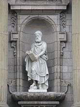 Sculpture of St. Matthew on the front facade of Basilica Cathedral.