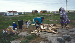 Inuit women preparing to make bannock.